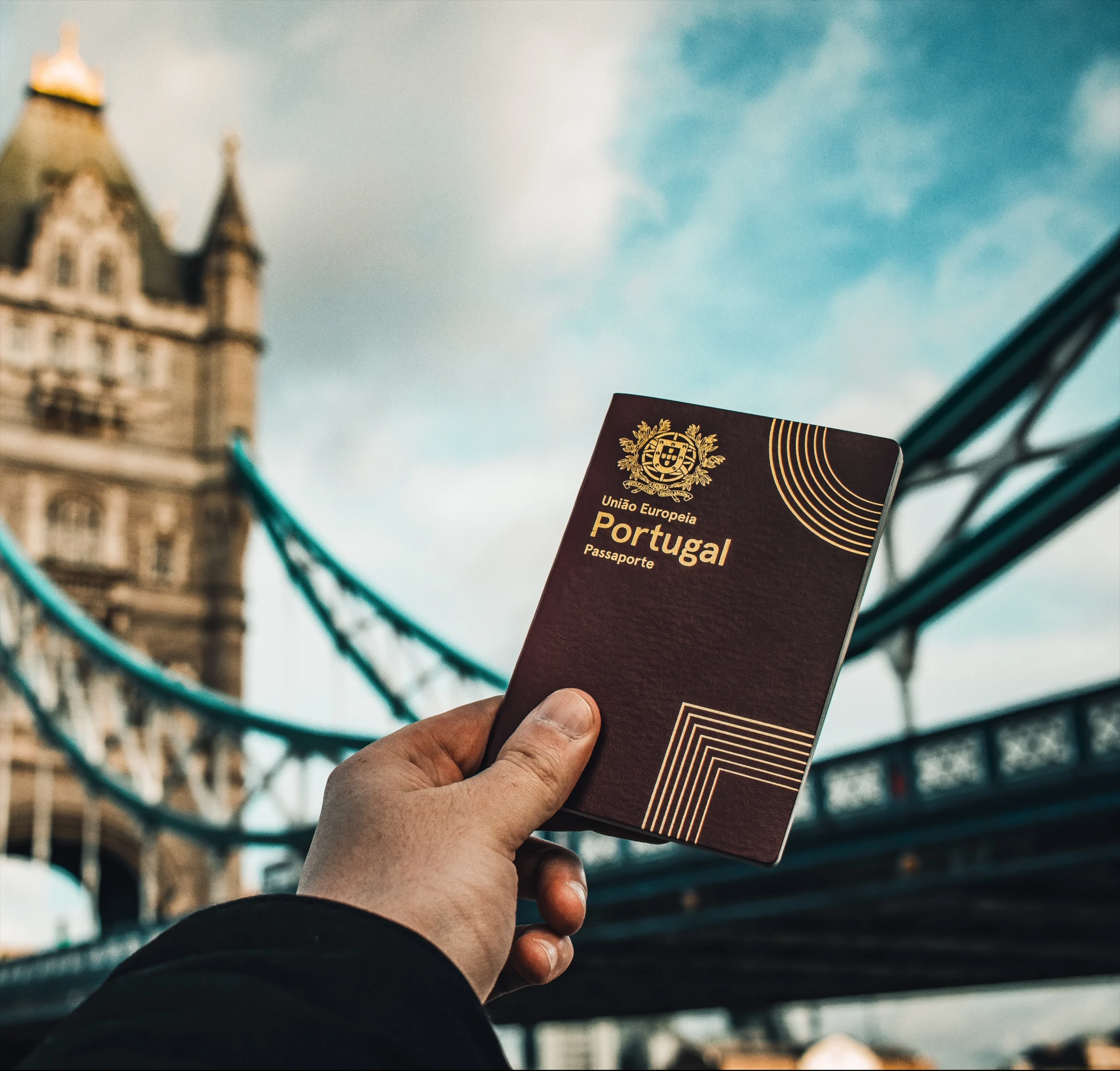 Hand holding an EU passport — the one form of identification you need